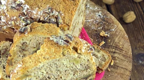 Fresh baked walnut bread (not loopable) Video stock 45315558