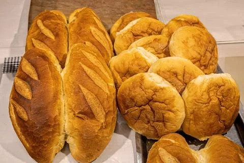 Fresh baked white wheat bread inside store shelf Stock Photos