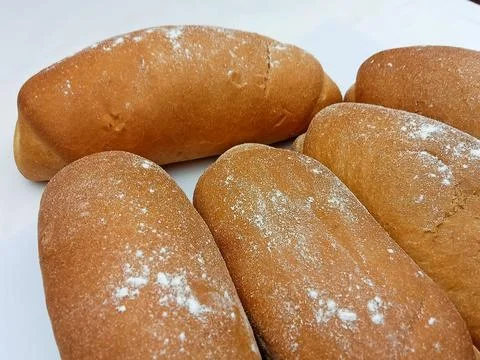 Fresh bakery bread rolls with flour on top Stock Photos