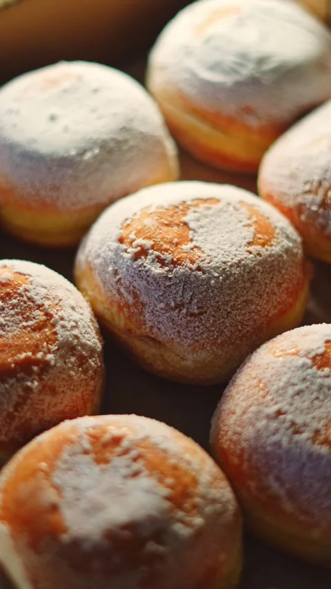 Fresh bakery donuts with powdered sugar, festive dessert concept Stock Footage 328748254