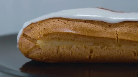 Fresh from the bakery - French Eclair pastry Stock Footage 71746732