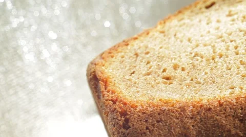 Fresh bakery loaf of bread on white background. Close up slow panorama. Stock Footage 50582197