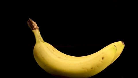 Fresh Bananas in Black Background Stock Footage 230670091