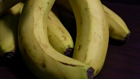 Fresh bananas on the table Stock Footage 128200067