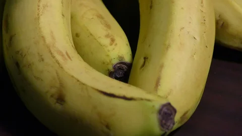 Fresh bananas on the table Stock Footage 128200097