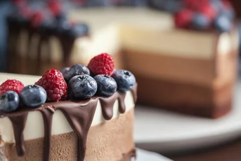 Fresh beautiful chocolate cake with fruit and berry Stock Photos