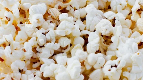 Fresh beautiful popcorn close-up rotates as background Video stock 149266701