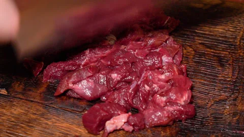Fresh beef meat for cooking, cut with a knife Stock Footage 252067765