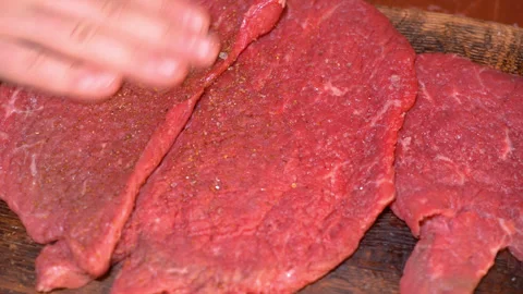 Fresh beef meat for cooking, rubbed with spices Stock Footage 249736950