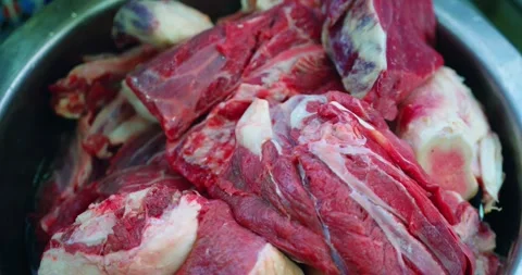 Fresh beef for pilaf being washed with clean water, close up Stock Footage 329621213