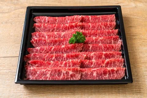 Fresh beef raw sliced with marbled texture Stock Photos