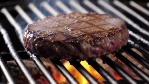 Fresh Beef Steak Cooking on Hot Grill in Professional Kitchen – Juicy Meat, Rest Stock Footage 326355359