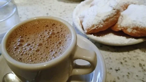 Fresh beignets and chicory coffee Stock Footage
