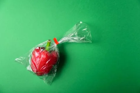Fresh bell pepper in disposable plastic package Stock Photos
