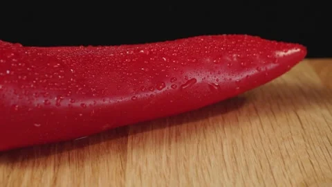 Fresh bell peppers on a dark background Video stock 131978716
