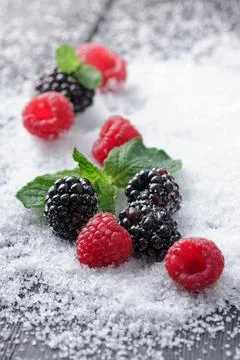 Fresh Berries with snow and mint Foto stock