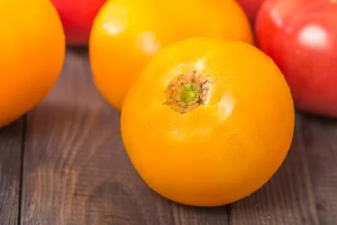 Fresh big red and yellow tomatoes Stock Photos