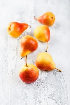 Fresh bio pears on the grey background Stock Photos