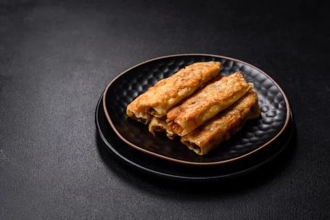 Fresh bite rolls from leaves of cabbage with minced meat, onions and carrots Stock Photos