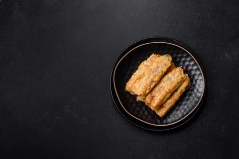 Fresh bite rolls from leaves of cabbage with minced meat, onions and carrots Stock Photos