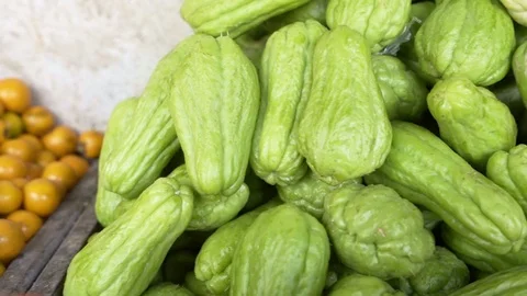 Fresh bitter melon close up and focus moving left to right for fruit concept Stock Footage 119372224