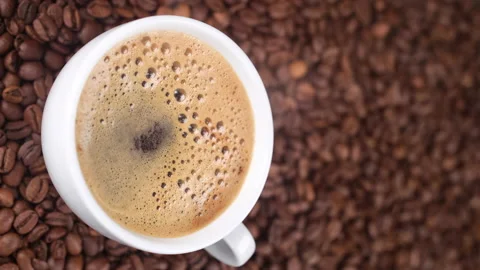 Fresh black coffee in cup. Vertical video Video stock 233694589