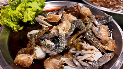 Fresh Blue Crab Pieces and Claws on a Plate at a Thai Seafood Market Stock-Footage 342500552