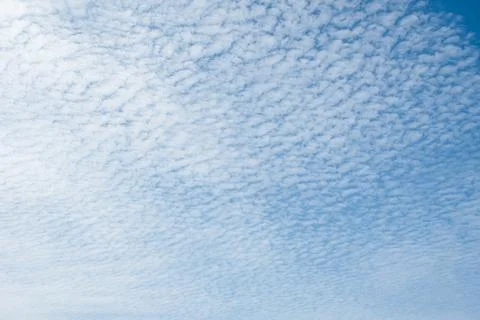 Fresh blue sky and soft white clouds, clean on a hot summer day. The concep.. Stock Photos