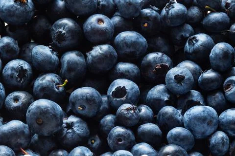 Fresh blueberry berries background pattern close up, top view Foto stock