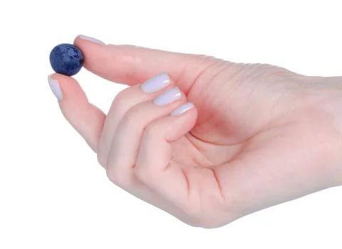 Fresh blueberry in hand Stock Photos