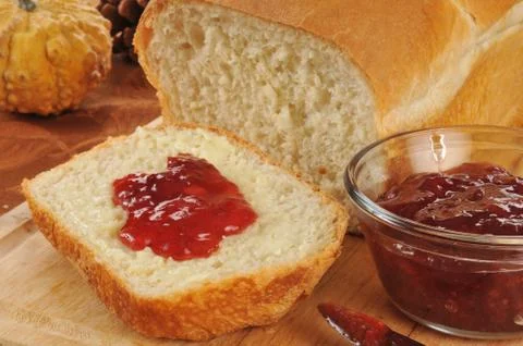 Fresh bread and jam Stock Photos