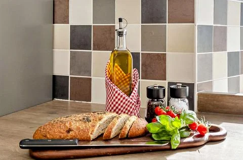 Fresh bread and  tomatoes Stock Photos