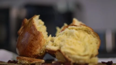 Fresh bread, broken and steam comes out of it. Stock Footage 159369631