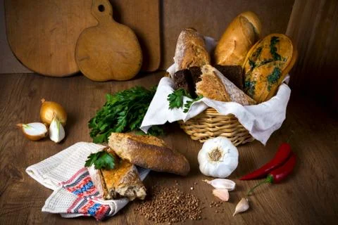 Fresh bread, buckwheat bread, garlic bread, French baguette Stock Photos