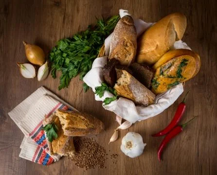 Fresh bread, buckwheat bread, garlic bread, French baguette Stock Photos