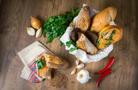 Fresh bread, buckwheat bread, garlic bread, French baguette Stock Photos