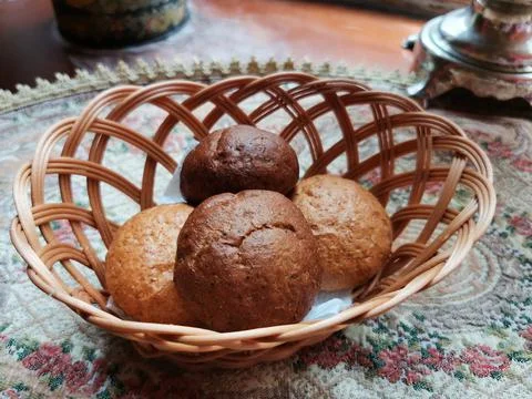 Fresh bread buns in a basket on a table in a russian style restaurant Stock Photos