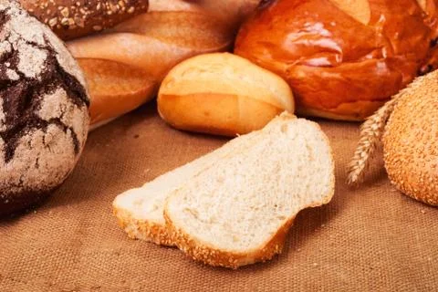 Fresh bread  on the burlap Stock Photos