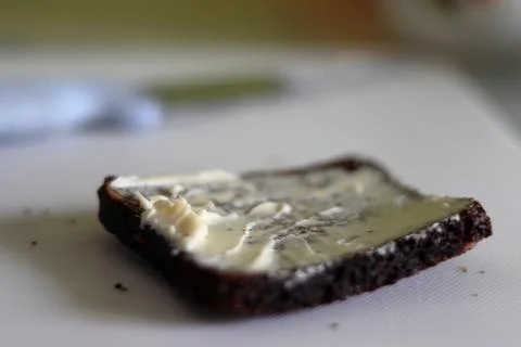 Fresh Bread with Butter: A Delicious Bite Stock Photos