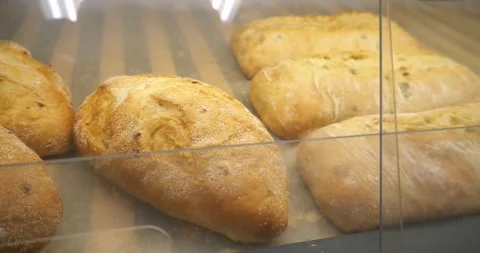 Fresh bread on the counter in a bakery Stock-Footage 261869687