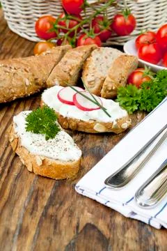 Fresh bread with herb curd dinner Stock Photos