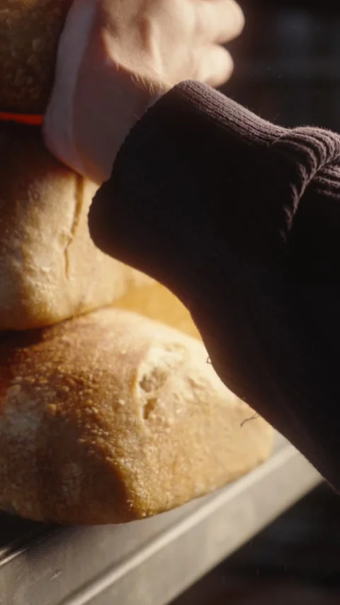 Fresh Bread Loaves Packed into Paper Bag for Transport Stock Footage 345593161
