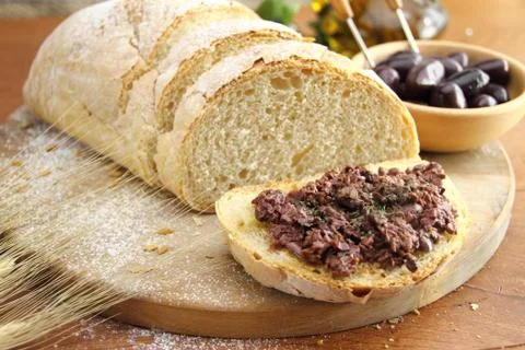 Fresh bread with olive tapenade Stock Photos