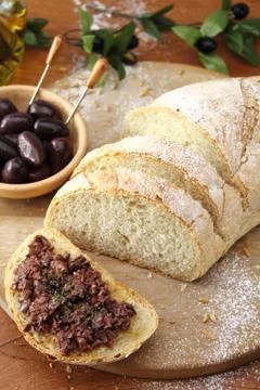 Fresh bread with olive tapenade Stock Photos