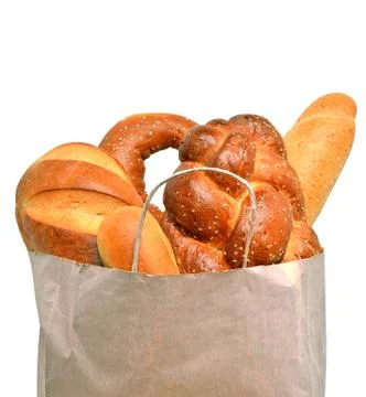 Fresh bread in the paper bag Stock Photos