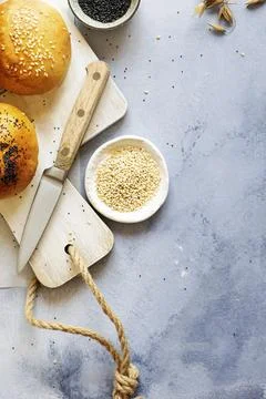 Fresh bread rolls on a cutting board Stock Photos