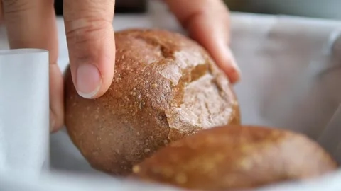 Fresh bread rolls served at a local bakery in the morning Stock Footage 332826817