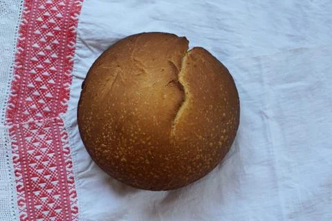 Fresh bread  on rustic  tablecloth Stock Photos