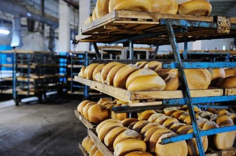 Fresh bread on a shelf in a bakery Stock Photos