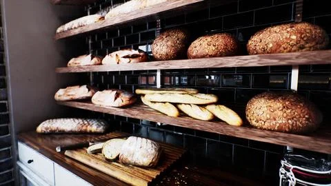 Fresh bread on shelves in bakery Stock Illustration